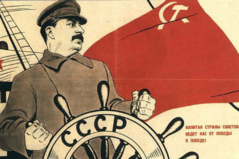 Soviet leader Joseph Stalin at the helm. 1930s Soviet propaganda poster.